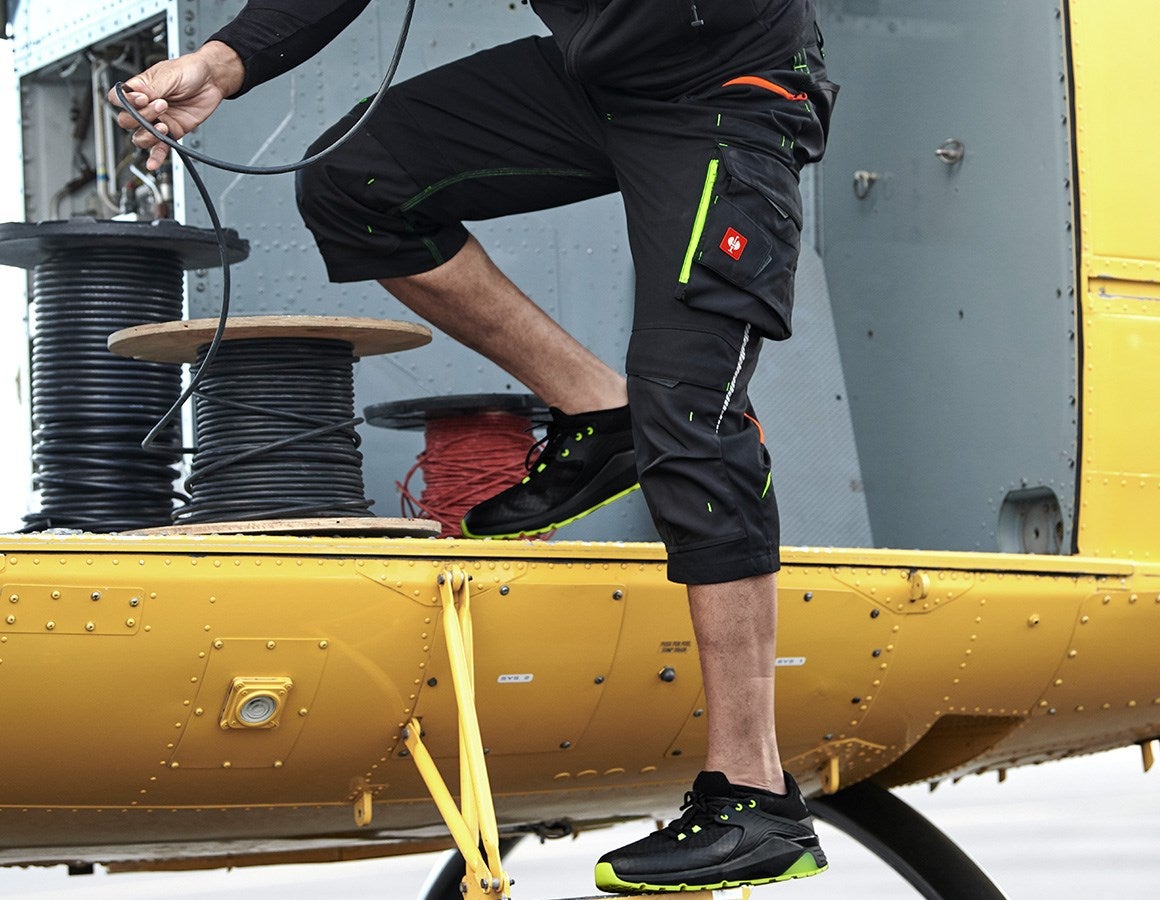 Main action image 3/4 length trousers e.s.motion 2020 black/high-vis yellow/high-vis orange