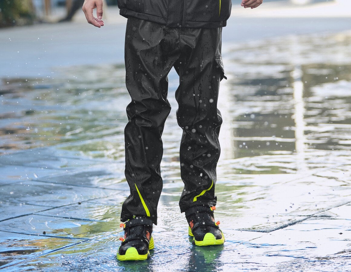 Main action image Rain trousers e.s.motion 2020 superflex,children's black/high-vis yellow/high-vis orange