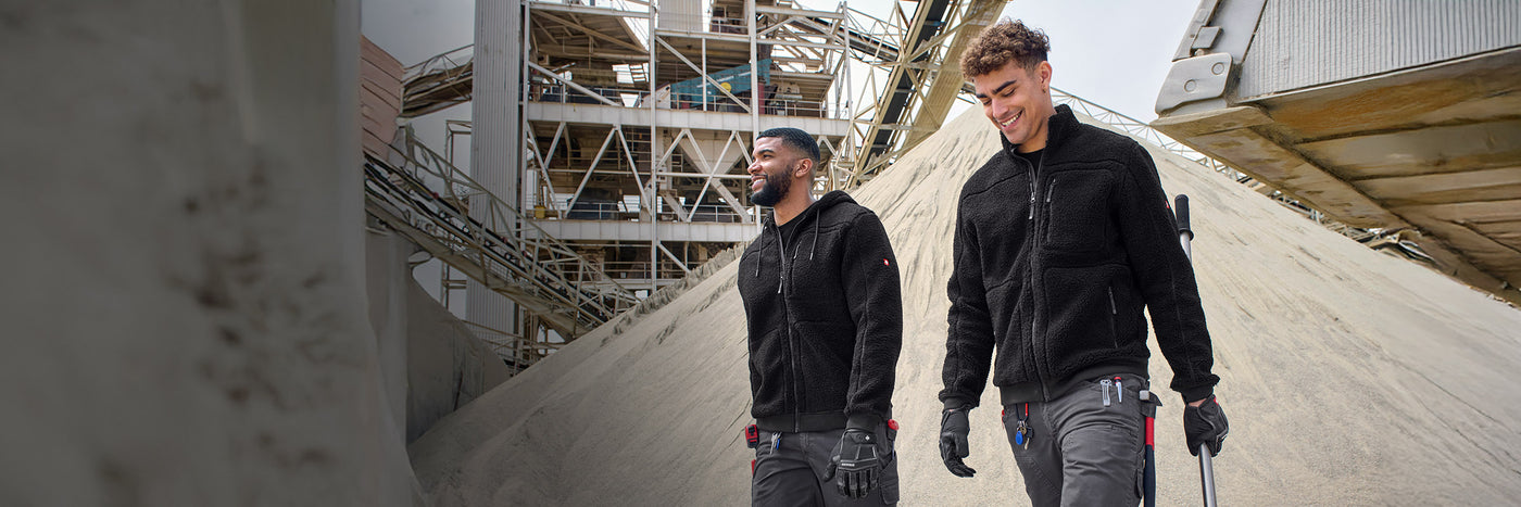Two men wearing fleece jackets from the e.s.e:pic collection