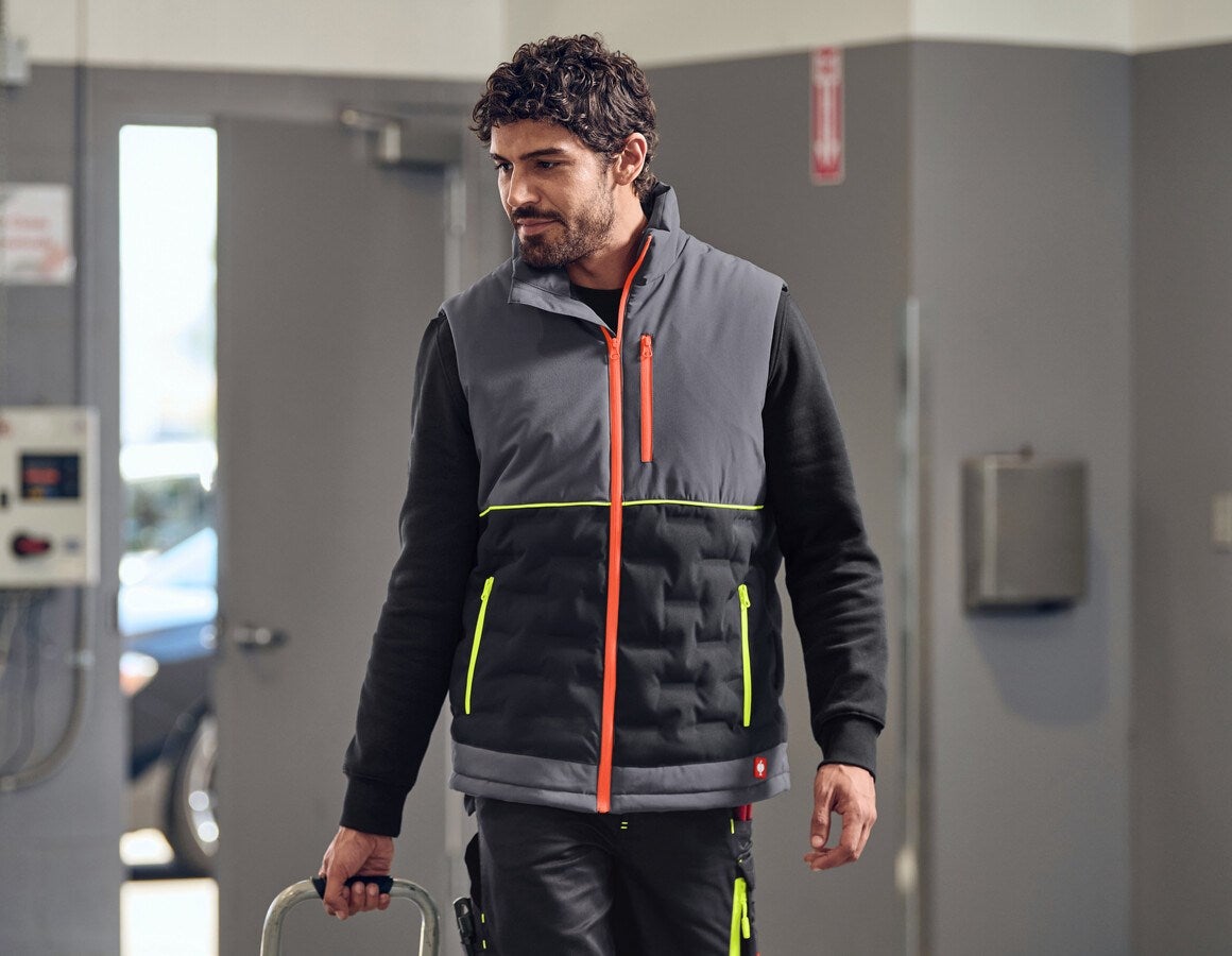 Main action image e.s. Padded bodywarmer anthracite/black/high-vis orange/high-vis yellow